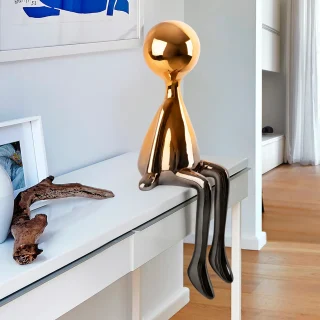 Figura Decorativa Gris Naranja Sit Down Schuller